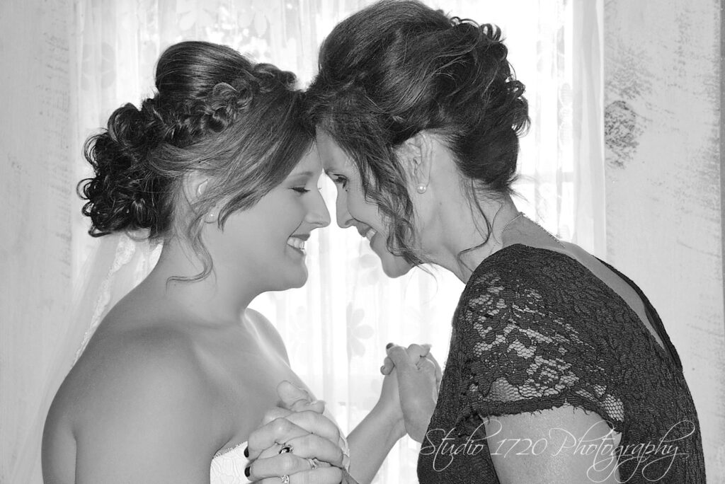 mother daughter moment at The Barn at Blueberry Hill a locally owned wedding venue  with lodging, bartender and DJ in Elkin NC located near Winston-Salem and Charlotte