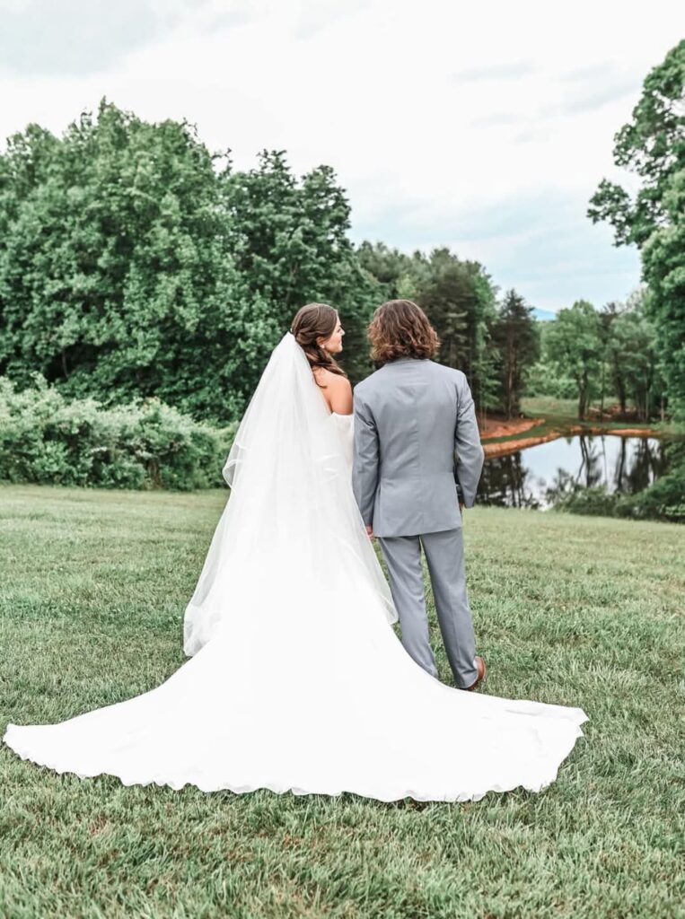 view of pond and Blue Ridge Mountains The Barn at Blueberry Hill wedding venue with lodging located in Elkin, NC near Winston-Salem and Charlotte