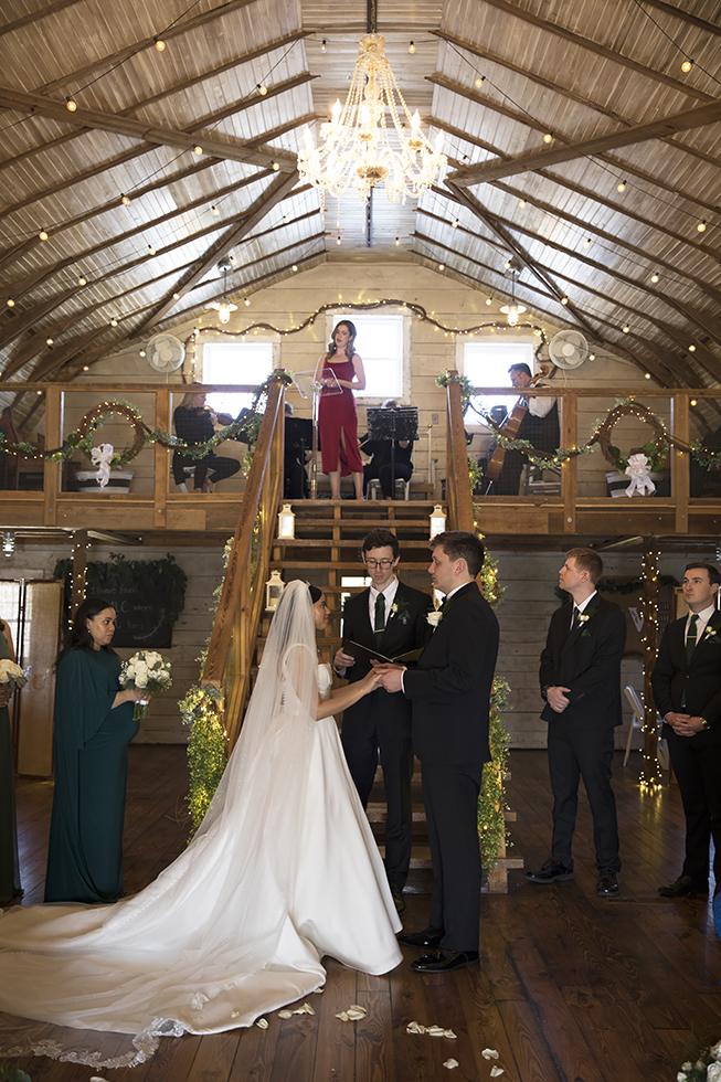 Indoor wedding at The Barn at Blueberry Hill with live music in the loftThe Barn at Blueberry Hill wedding venue with lodging located in Elkin, NC near Winston-Salem and Charlotte