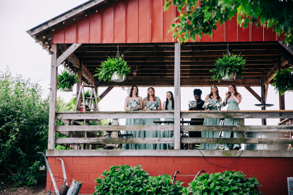 spring wedding with ferns at locally owned wedding venue The Barn at Blueberry Hill in Elkin NC located near Winston-Salem and Charlotte