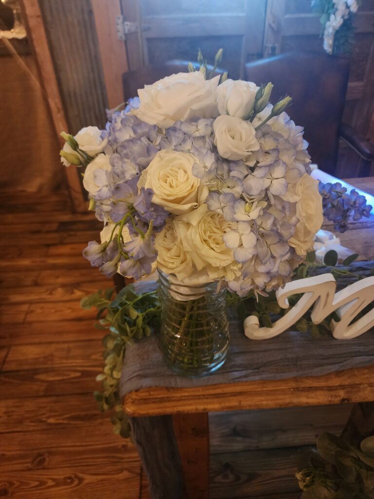 spring wedding at locally owned wedding venue The Barn at Blueberry Hill in Elkin NC located near Winston-Salem and Charlotte