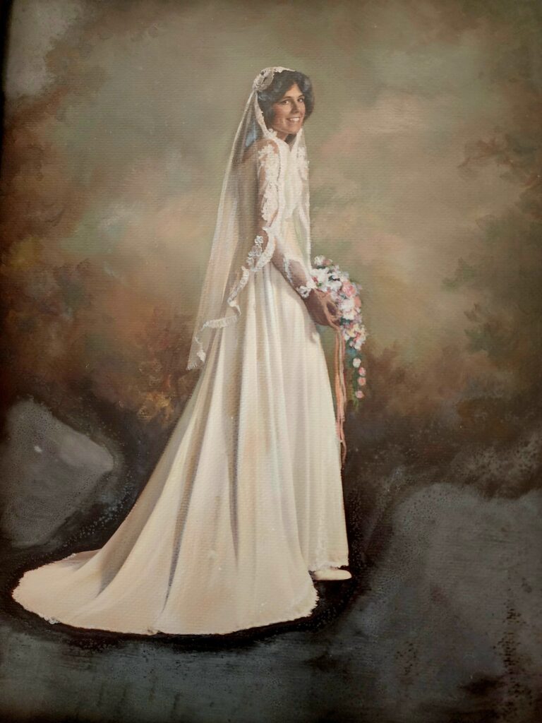 sister of owner in wedding gown at the Barn at Blueberry Hill a locally owned wedding venue in Elkin NC with lodging, DJ and bartender included near Winston-Salem and Charlotte