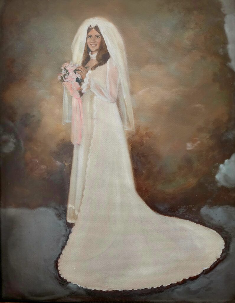 owner in wedding dress of the Barn at Blueberry Hill a locally owned wedding venue in Elkin NC with lodging, DJ and bartender included near Winston-Salem and Charlotte