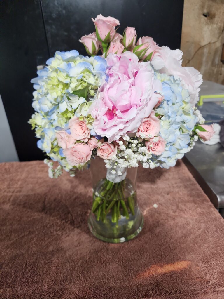 Bridal bouquet designed by The Barn at Blueberry Hill locally owned wedding venue in Elkin NC including bartender, DJ and lodging