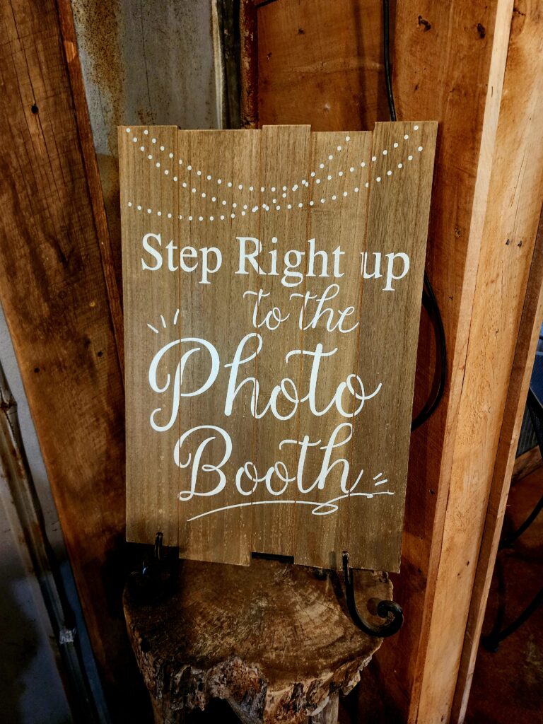 phot booth included at The Barn at Blueberry Hill locally owned wedding venue in Elkin NC including bartender, DJ and lodging