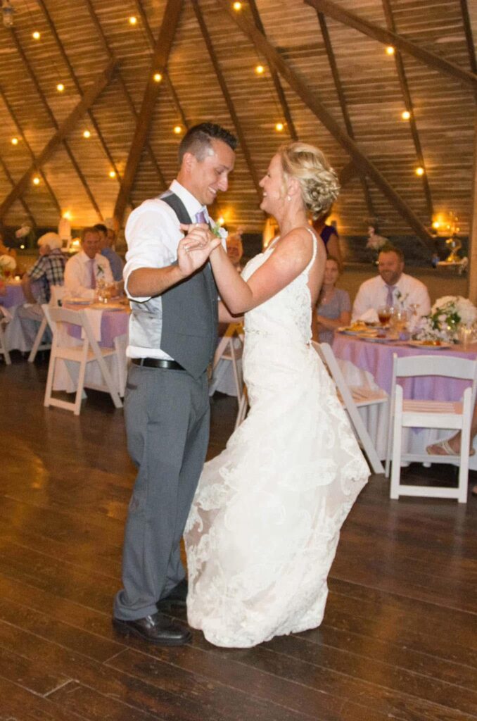 The Barn at Blueberry Hill a rustic wedding venue in Elkin NC close to Charlotte and Winston Salem includes DJ, lodging, bartender and table settings