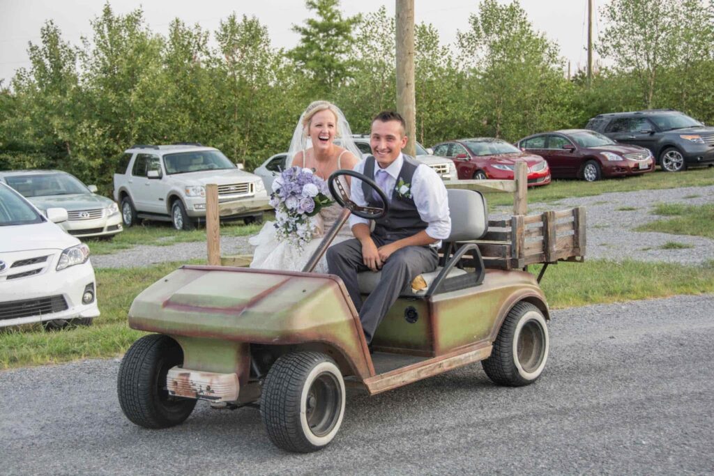 The Barn at Blueberry Hill a rustic wedding venue in Elkin NC close to Charlotte and Winston Salem includes DJ, lodging, bartender and table settings
