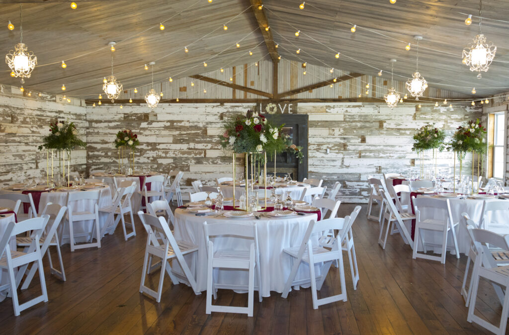 A charming, locally owned barn wedding venue in Northwest NC, offering on-site lodging and inclusive services such as a professional DJ and bartender to make your special day unforgettable.