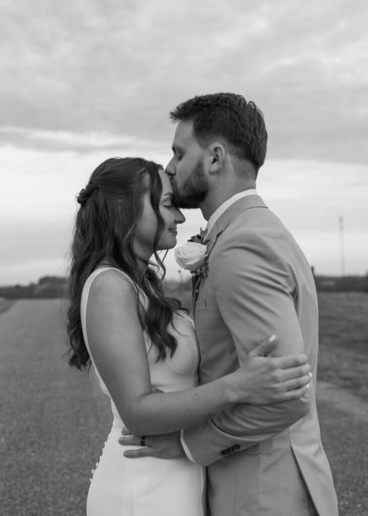 A charming, locally owned barn wedding venue in Northwest NC, offering on-site lodging and inclusive services such as a professional DJ and bartender to make your special day unforgettable.